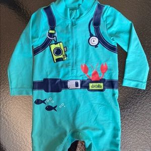 One piece rash guard and hat